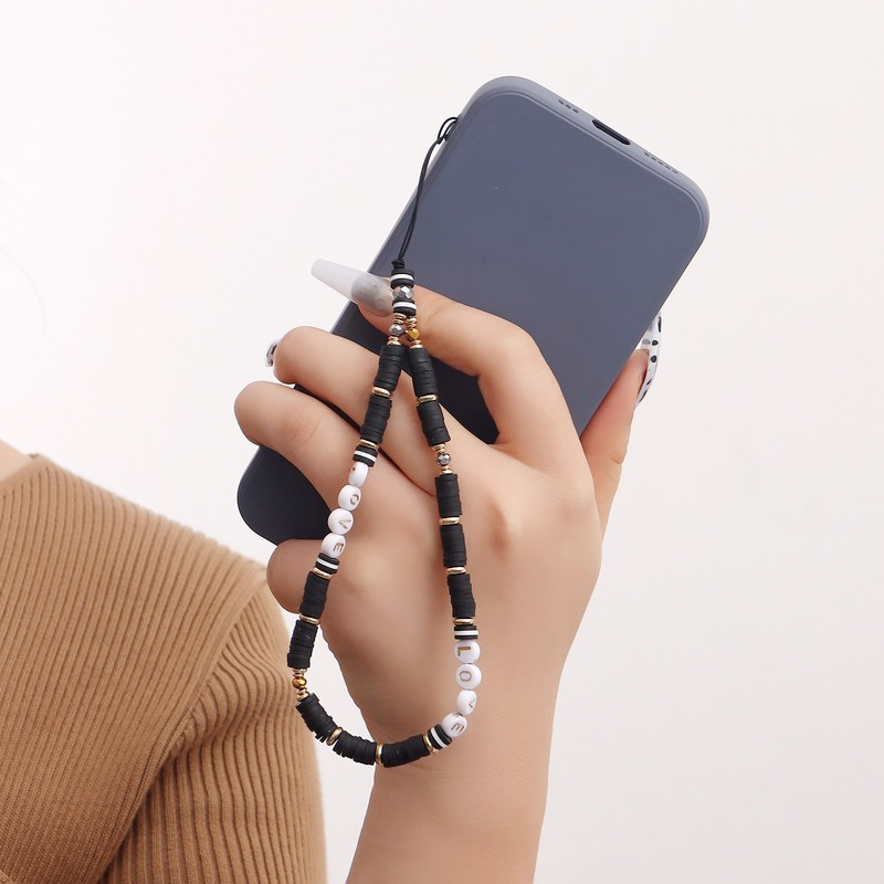 Women Accessories Picture - Corda de Celular de Argila Olho